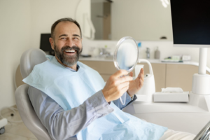 Dentist performing root canal treatment